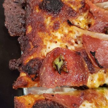Round Table Pizza - a close up of a pizza - Pizza Near Me - Tacoma, Washington Round Table Pizza - a close up of a pizza - Pizza Near Me - Tacoma, Washington