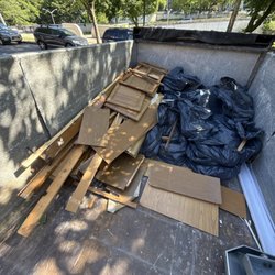 Ant’s Junk Removal - Kitchen cabinet junked and flooring
