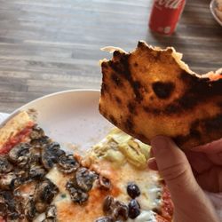 Isabella's Pizzeria Napoletana - This is thinner than frozen pizza and just as hard only 5x the cost