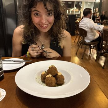 Il Lusso - my girlfriend and i about to enjoy the arancini - Steakhouses Near Me - Tallahassee, Florida