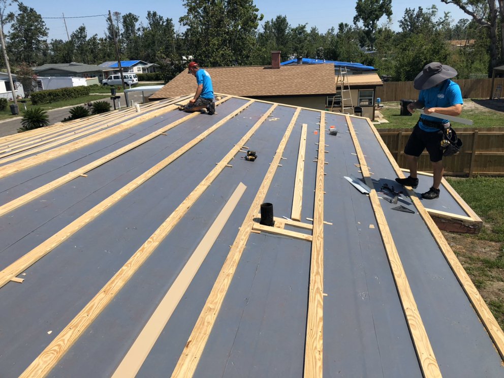 Slide of Old Town Roofing