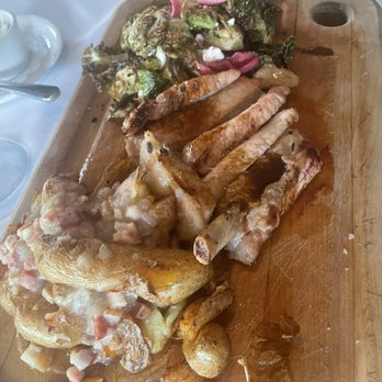 O'Learys Seafood Restaurant - Pork chop with brussel sprouts and potatoes - Seafood Near Me - Annapolis, Maryland