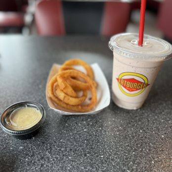 Fatburger - Light snack. Homemade Onion rings and strawberry Strawberry Milkshake - Burgers Near Me - Aurora, Colorado Fatburger - Light snack. Homemade Onion rings and strawberry Strawberry Milkshake - Burgers Near Me - Aurora, Colorado