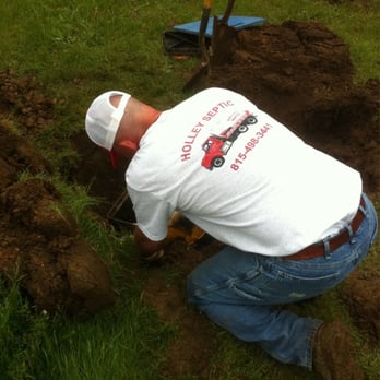 Holley Septic Service - Owner, Chuck Jennings making a repair. - Septic Services Near Me Holley Septic Service - Owner, Chuck Jennings making a repair. - Septic Services Near Me
