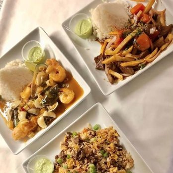 Caribbean Gardens - three plates of food on a table - Peruvian Near Me - Burlingame, California Caribbean Gardens - three plates of food on a table - Peruvian Near Me - Burlingame, California