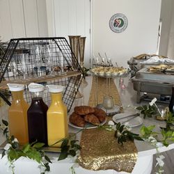 Bless My Soul Food Catering & More - Bottomless Mimosas with Peach , Cranberry and OJ . Deviled eggs and croissants.