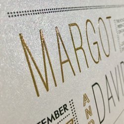 Wasi Printing & Graphics - Thermography printed weeding invitations on 105lb Pearl Cardstock with PMS 872 Metallic Gold and Black Raised Ink.