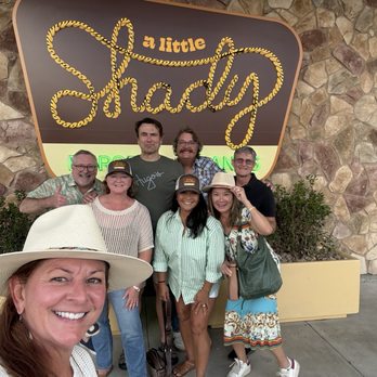 A Little Shady Restaurant - Our group in front of the restaurant sign. - American Near Me - Kyle, Texas A Little Shady Restaurant - Our group in front of the restaurant sign. - American Near Me - Kyle, Texas
