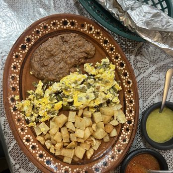 Buen Apetito - Nopales and egg with sides of refried beans and fried potatoes - Breakfast & Brunch Near Me - Harlingen, Texas Buen Apetito - Nopales and egg with sides of refried beans and fried potatoes - Breakfast & Brunch Near Me - Harlingen, Texas