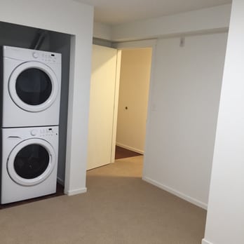 Areté - Half of the bedroom closet is taken by the washer and dryer - Apartments Near Me - Kirkland, Washington Areté - Half of the bedroom closet is taken by the washer and dryer - Apartments Near Me - Kirkland, Washington