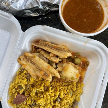 Cafe Central - mixta plate with arroz con gandules and cod stew - Puerto Rican Near Me - Chicago, Illinois