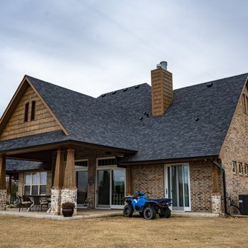 UBuildIt-Oklahoma City - a blue four wheeler parked in front of a house - General Contractors Near Me - Oklahoma City, Oklahoma UBuildIt-Oklahoma City - a blue four wheeler parked in front of a house - General Contractors Near Me - Oklahoma City, Oklahoma