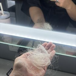 Enlighten Hair Studio - Left in foils too long. Hair started falling out in clumps. Scalp was itchy, burning and sore.