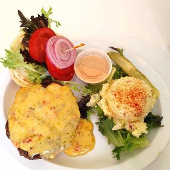 Cottage Cafe - a white plate with a sandwich and salad - Sandwiches Near Me - Louisville, Kentucky Cottage Cafe - a white plate with a sandwich and salad - Sandwiches Near Me - Louisville, Kentucky
