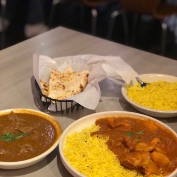Roti Grill - Lamb Curry and Chicken Vindaloo. Turmeric rice and garlic naan. - Indian Near Me - Dallas, Texas Roti Grill - Lamb Curry and Chicken Vindaloo. Turmeric rice and garlic naan. - Indian Near Me - Dallas, Texas