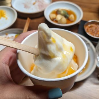 Nubiani - Free ice cream at the end of your meal. Vanilla ice cream and orange syrup I think it was? - Korean Near Me - New York, New York Nubiani - Free ice cream at the end of your meal. Vanilla ice cream and orange syrup I think it was? - Korean Near Me - New York, New York
