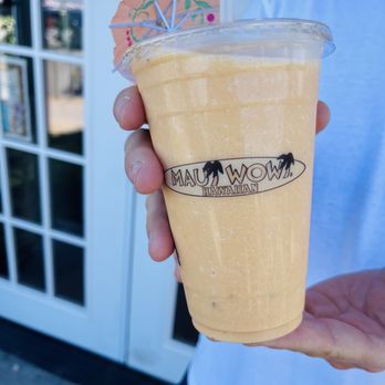 Maui Wowi - a person holding a drink in their hand - Hawaiian Near Me - Plymouth, Massachusetts