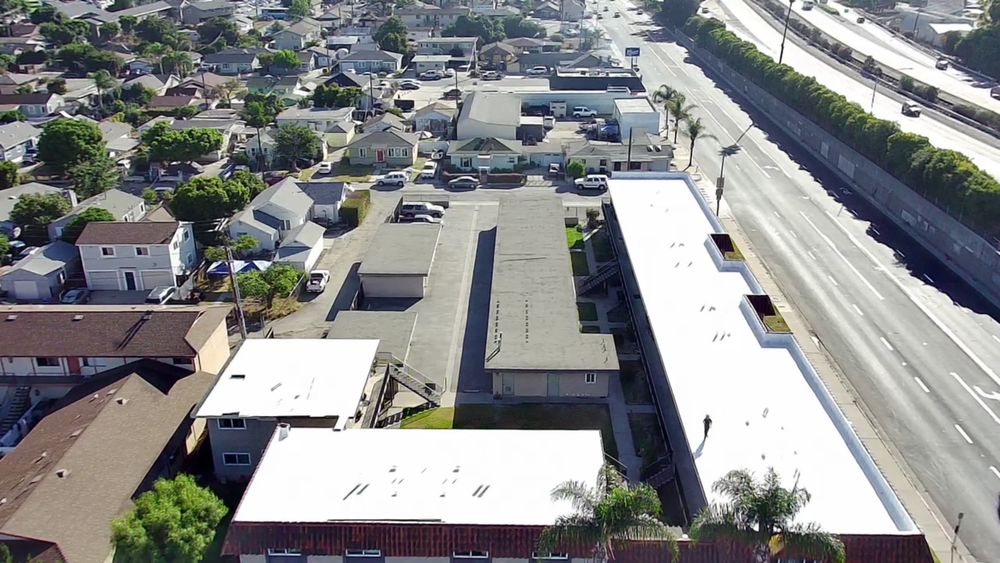 Slide of Queen Roofing