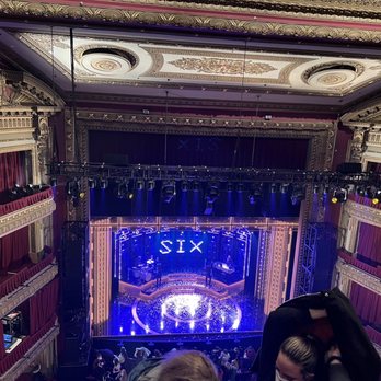 CIBC Theatre - Picture inside theatre with show SIX - Performing Arts Near Me - Chicago, Illinois CIBC Theatre - Picture inside theatre with show SIX - Performing Arts Near Me - Chicago, Illinois