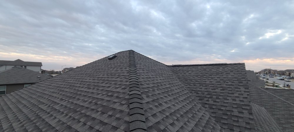 Slide of Sutton Roofing