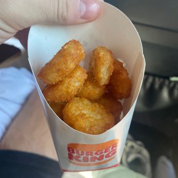Burger King - a hand holding a box of fried tater tots - Burgers Near Me - Defuniak Springs, Florida
