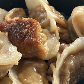 Meet Rice - Fried 63. Pork Dumplings (8) - Chinese Near Me - Massapequa, New York