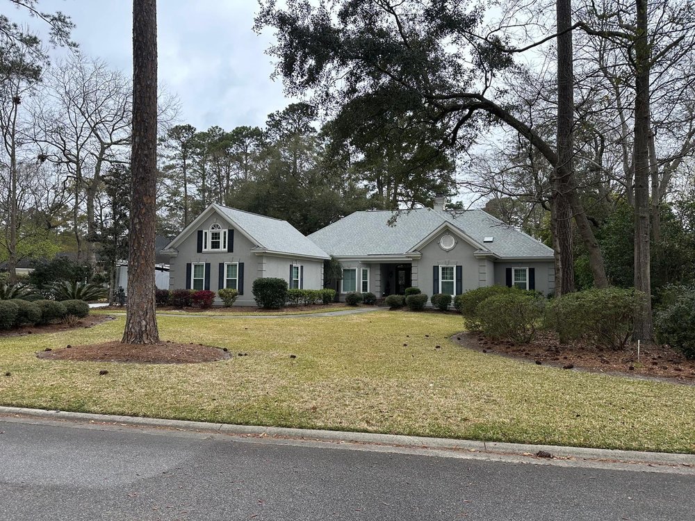 Slide of Palma's Roofing Experts