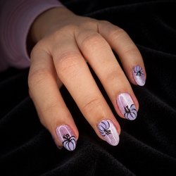 Pure Nails Spa - Soft purple with a playful little twist.