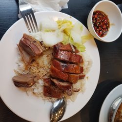 Mr Ping's - Roasted Duck that is on a hard side..taste like it's been reheated same with the rice.