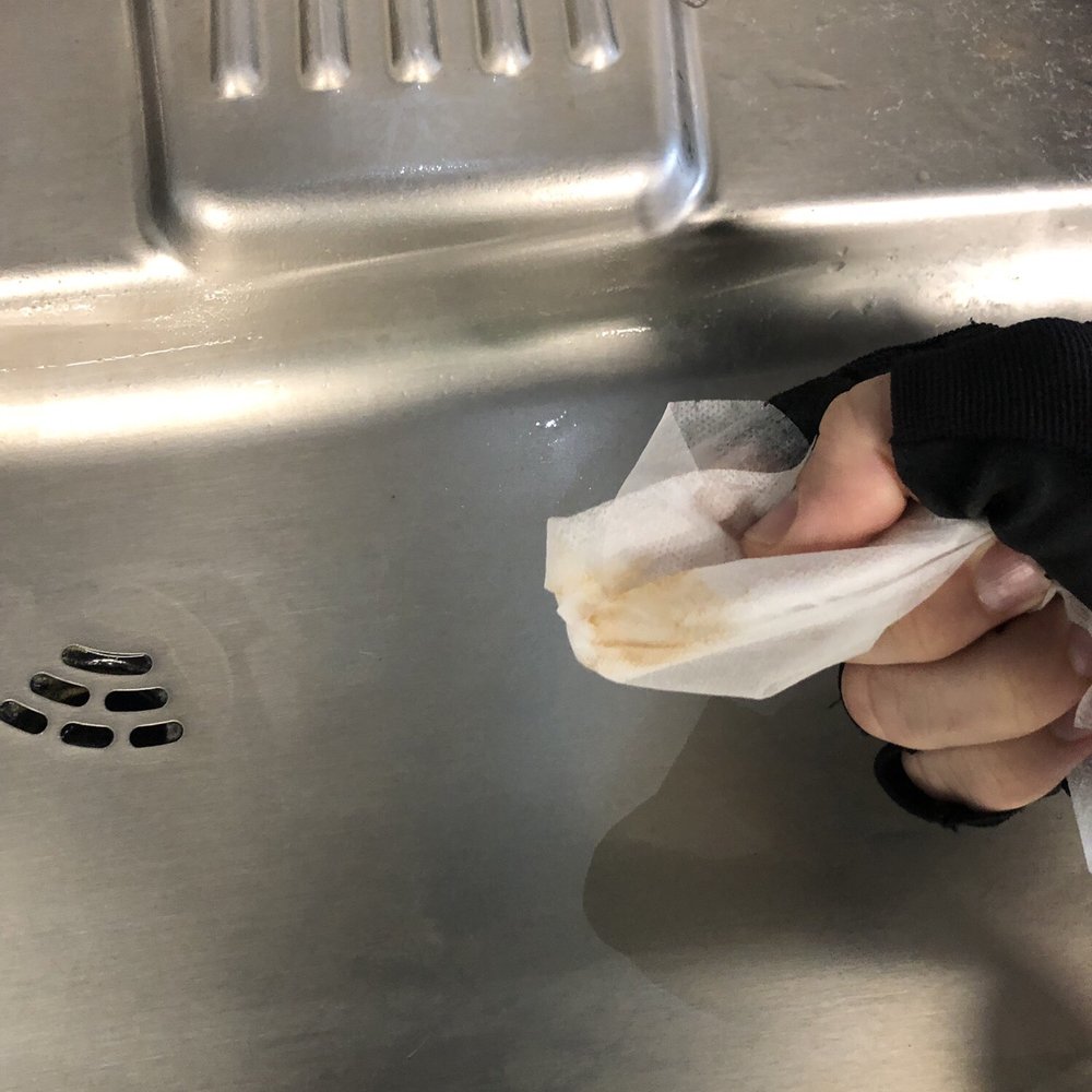 Filth and film on the gym water fountain which is rarely cleaned