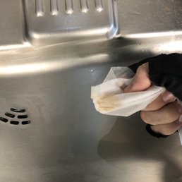 Filth and film on the gym water fountain which is rarely cleaned Filth and film on the gym water fountain which is rarely cleaned