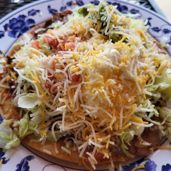 Fuego Azteca - The pollo (Shredded Chicken) tostada, size is medium, solid 'B' grade - Mexican Near Me - Erie, Colorado