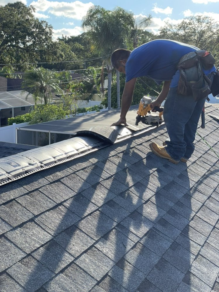 Slide of Clover Roofing