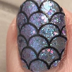 ColorStreet - I call it mermaid tail. I adore the iridescent colors and scale shapes.