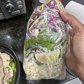 Pho Saigon - Bag of assorted accompaniments - Vietnamese Near Me - Catonsville, Maryland