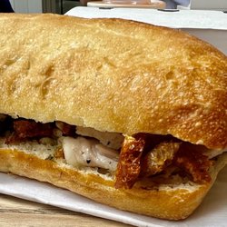 Porchetta sandwich: porchetta, cracking, salsa verde (CAD $12.50)