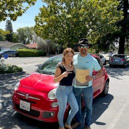 Jessica and I, after getting auto insurance for the Fiat. Jessica and I, after getting auto insurance for the Fiat.