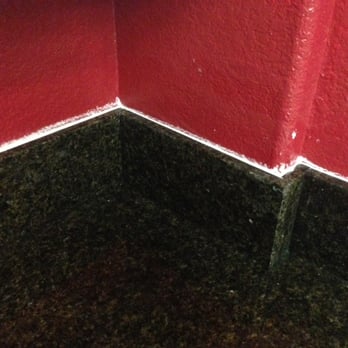 Stone Depot & More - The installers thought messy white caulk wasn't clownish and terrible for some reason. Photo per Sean's request. - Cabinetry Near Me - Carlsbad, California