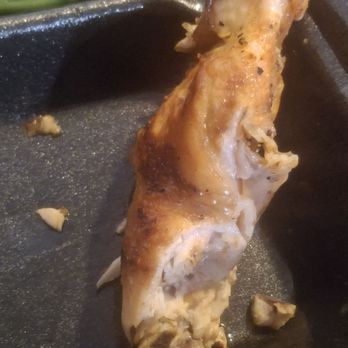 Cowboy Chicken - HALF of an uneaten chicken thigh - American Near Me - Dallas, Texas Cowboy Chicken - HALF of an uneaten chicken thigh - American Near Me - Dallas, Texas