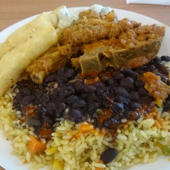 La Cocina De Abuela - Lunch special--porkchop black beans rice and yuca - Cuban Near Me - Gainesville, Florida La Cocina De Abuela - Lunch special--porkchop black beans rice and yuca - Cuban Near Me - Gainesville, Florida