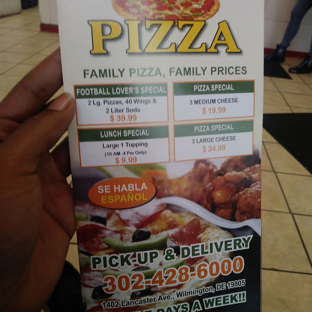 Ginos Pizza - a hand holding up a menu - Pizza Near Me - Wilmington, Delaware