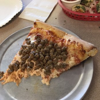 Goodfella's Pizza - Half eaten slice with sausage! Too hungry to snap a pic before - Pizza Near Me - Wylie, Texas