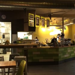 Laughing Planet - Ordering counter, and a view into the kitchedn