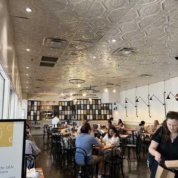 Cafe Bernardo  - eople sitting at tables in a restaurant - New American Near Me - Davis, California