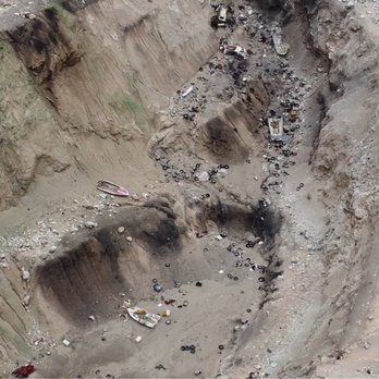 Wheel of Misfortune - 300ft Pit was a dumping ground for boats and cars in the desert - Landmarks & Historical Buildings Near Me - Henderson, Nevada Wheel of Misfortune - 300ft Pit was a dumping ground for boats and cars in the desert - Landmarks & Historical Buildings Near Me - Henderson, Nevada