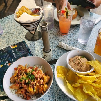 Nico's Pier 38 - Truffle fries, virgin punch, fisherman's stew, blue moon, fish dip, fish bites - Seafood Near Me - Honolulu, Hawaii Nico's Pier 38 - Truffle fries, virgin punch, fisherman's stew, blue moon, fish dip, fish bites - Seafood Near Me - Honolulu, Hawaii