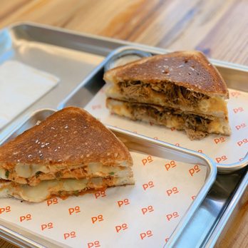 Papi Queso - Pig Mac and Buffalo Chicken - New American Near Me - Charlotte, North Carolina Papi Queso - Pig Mac and Buffalo Chicken - New American Near Me - Charlotte, North Carolina