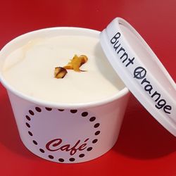 Polka Dot - Our Homemade Burnt Orant Ice Cream with charred Cara Cara oranges in a delightful orange ice cream.