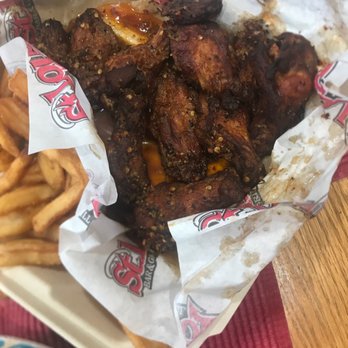St. Louis Bar & Grill - chicken wings and french fries - Chicken Wings Near Me - Toronto, Ontario St. Louis Bar & Grill - chicken wings and french fries - Chicken Wings Near Me - Toronto, Ontario