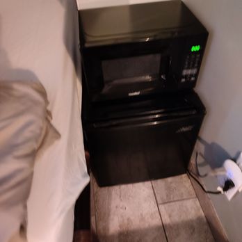 Nomads Hotel - Mini frig and microwave in cubby beside the bed - Hotels Near Me - San Clemente, California